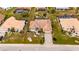 Property overview showcasing house, landscaping, and neighborhood context at 2003 Captiva Ct, Sun City Center, FL 33573