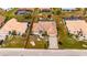 House and property view from above, showing landscaping and neighborhood at 2003 Captiva Ct, Sun City Center, FL 33573