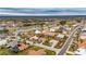 Aerial view showing home's location in a community with golf course and lake at 2003 Captiva Ct, Sun City Center, FL 33573