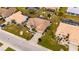 House with surrounding landscape and neighboring homes at 2003 Captiva Ct, Sun City Center, FL 33573