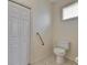 Small bathroom with toilet and built-in storage at 2003 Captiva Ct, Sun City Center, FL 33573
