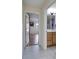 Bathroom hallway with access to bedroom and updated bath at 2003 Captiva Ct, Sun City Center, FL 33573