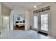Open and spacious entryway with view of bedroom and double doors at 2003 Captiva Ct, Sun City Center, FL 33573