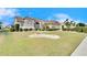 Well-maintained house with attractive landscaping and a spacious lawn at 2003 Captiva Ct, Sun City Center, FL 33573