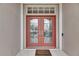 Inviting entryway featuring double doors with decorative glass at 2003 Captiva Ct, Sun City Center, FL 33573