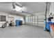 Attached garage with ample space for storage and vehicles at 2003 Captiva Ct, Sun City Center, FL 33573