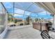 Hot tub in screened enclosure with backyard view at 2003 Captiva Ct, Sun City Center, FL 33573