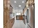 Spacious kitchen with granite countertops and stainless steel appliances at 2003 Captiva Ct, Sun City Center, FL 33573