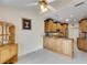Updated kitchen with granite countertops and stainless steel appliances at 2003 Captiva Ct, Sun City Center, FL 33573