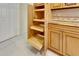 Large pantry with pull-out shelves for optimal storage at 2003 Captiva Ct, Sun City Center, FL 33573