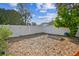 Backyard with raised garden bed and wood chips at 2126 7Th N Ave, St Petersburg, FL 33713