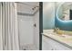 Updated bathroom with white subway tile shower, pebble floor, and white vanity at 2126 7Th N Ave, St Petersburg, FL 33713