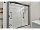 Updated bathroom featuring a walk-in shower with glass doors at 2126 7Th N Ave, St Petersburg, FL 33713