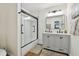 Modern bathroom with a double vanity and a large glass shower at 2126 7Th N Ave, St Petersburg, FL 33713