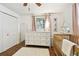 Bedroom with crib, dresser, and ample closet space at 2126 7Th N Ave, St Petersburg, FL 33713