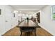 Dining room with a long wooden table and gray chairs at 2126 7Th N Ave, St Petersburg, FL 33713