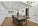 Dining area with farmhouse table and access to bathroom at 2126 7Th N Ave, St Petersburg, FL 33713