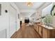 Light and airy hallway with wood flooring and access to other rooms at 2126 7Th N Ave, St Petersburg, FL 33713