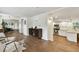 Open concept living room with a view into the kitchen at 2126 7Th N Ave, St Petersburg, FL 33713