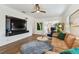 Spacious living area showcasing a large TV and comfortable seating at 2126 7Th N Ave, St Petersburg, FL 33713