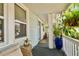 Relaxing front porch with seating and potted plants at 2126 7Th N Ave, St Petersburg, FL 33713