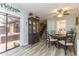 Bright dining area with a round table and chairs, near kitchen and patio at 2601 2Nd Ct, Palm Harbor, FL 34684