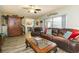 Spacious living room with leather furniture and hardwood floors at 2601 2Nd Ct, Palm Harbor, FL 34684
