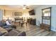 Spacious living room with leather furniture and hardwood floors at 2601 2Nd Ct, Palm Harbor, FL 34684