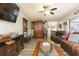 Spacious living room with leather furniture and hardwood floors at 2601 2Nd Ct, Palm Harbor, FL 34684