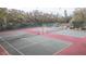 Two well-maintained tennis courts at 2601 2Nd Ct, Palm Harbor, FL 34684