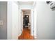 Clean hallway with hardwood floors leading to bedrooms at 2809 N 29Th St, Tampa, FL 33605