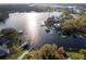 Aerial view of lakefront homes and properties at 2972 Lake Saxon Dr, Land O Lakes, FL 34639