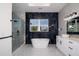 Luxurious bathroom with free-standing tub and marble details at 2972 Lake Saxon Dr, Land O Lakes, FL 34639