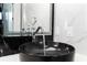 Stylish bathroom with a vessel sink and chrome faucet at 2972 Lake Saxon Dr, Land O Lakes, FL 34639