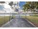 Gated entrance to waterfront community at 2972 Lake Saxon Dr, Land O Lakes, FL 34639