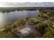 Scenic park with gazebos and volleyball court near lake at 2972 Lake Saxon Dr, Land O Lakes, FL 34639