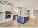 Bright, open kitchen featuring a central island, stainless steel appliances, and sleek white cabinetry at 29800 Cassino Ct, Wesley Chapel, FL 33543