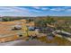 Aerial view of home with pond, barn and private dock at 3050 Maple Trce, Tarpon Springs, FL 34688