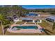 Inviting pool area with spa and patio furniture at 3050 Maple Trce, Tarpon Springs, FL 34688