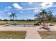 Relaxing pool area with patio and seating at 3050 Maple Trce, Tarpon Springs, FL 34688