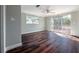 Bright bedroom featuring wood floors and sliding glass doors to deck at 3212 W Arch St, Tampa, FL 33607