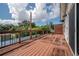 Outdoor deck with wooden railings and string lights at 3212 W Arch St, Tampa, FL 33607