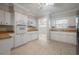 White cabinets and a large kitchen sink at 3212 W Arch St, Tampa, FL 33607