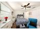 Bedroom with ceiling fan, dresser, and window blinds at 3517 Kingsbury Dr, Holiday, FL 34691