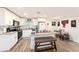 Modern kitchen with white cabinets and granite countertops at 3517 Kingsbury Dr, Holiday, FL 34691