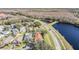 Aerial view of house near lake at 3706 Lonewood Ct, Land O Lakes, FL 34638