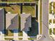 Aerial view of two houses with yards at 38296 Sonnet Landing Ave, Zephyrhills, FL 33540