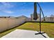 Private backyard with patio and umbrella at 38296 Sonnet Landing Ave, Zephyrhills, FL 33540