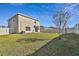 Spacious backyard with home view at 38296 Sonnet Landing Ave, Zephyrhills, FL 33540