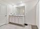 Clean bathroom with double vanity and shower at 38296 Sonnet Landing Ave, Zephyrhills, FL 33540